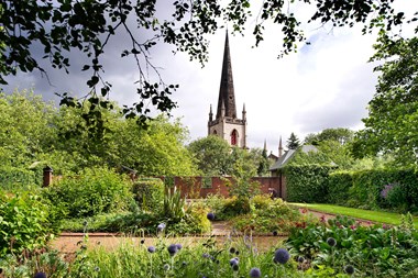 Walsall Memorial Garden, with church in background.