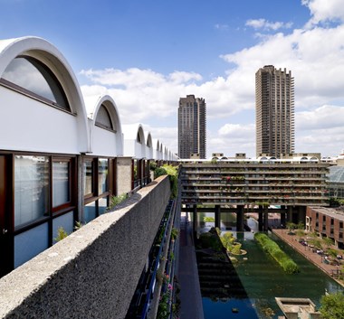 A digital colour photograph showing the edge of Andrewes House at the Barbican from a high vantage point.