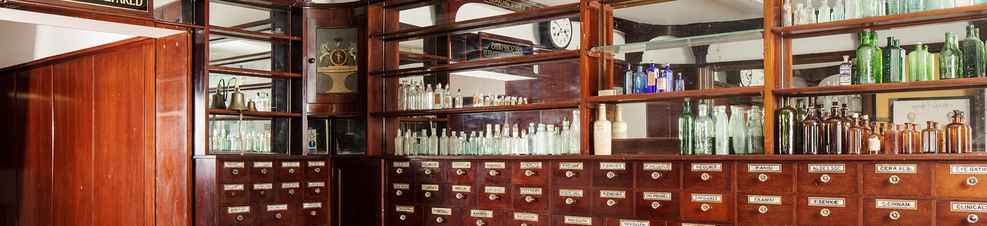 Interior of chemist shop with original drawers and shelves