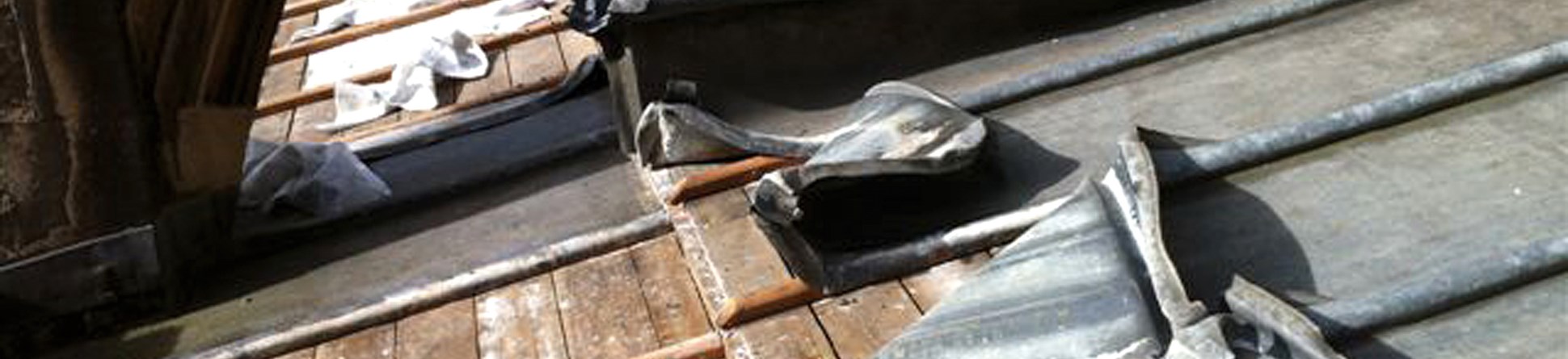 Image of the damage caused by metal theft from the roof of a historic place of worship.