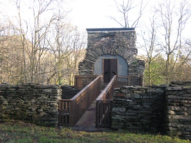 Image of renewed footbridge and flat roof to the upper level of the furnace.