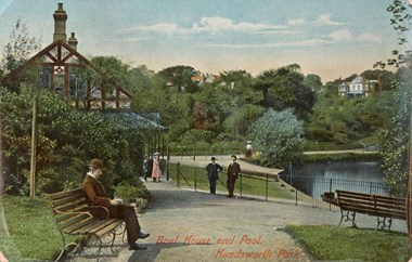 A Victorian chap is depicted sitting on a bench in a postcard of Handsworth Park that shows a general view of the boat house and pool