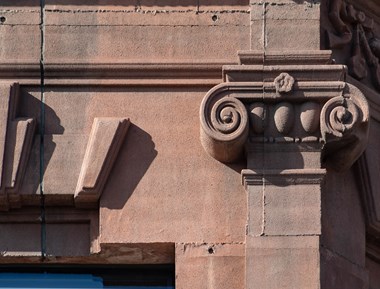 Detail of a pilaster and dressings on a reinstated facade.