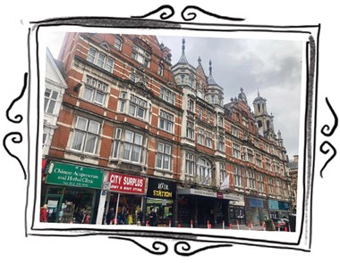 Photo of a row of shops on Granby Street in Leicester in 2021 displayed inside a hand-drawn frame.