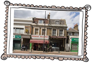 General view of Kennedy's Sausages and Norwood Halal Meat on South Norwood High Street. Displayed inside a hand-drawn frame.