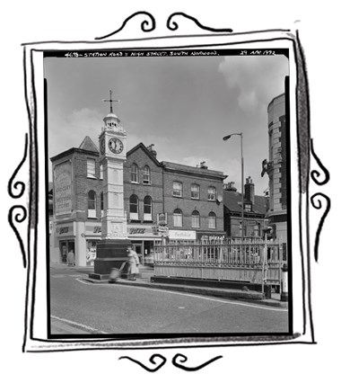 Photo of clock tower at junction of Station Road with High Street, South Norwood. Photographed in 1992 and displayed in a hand-drawn frame.