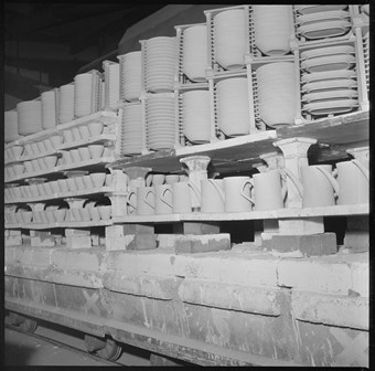 Ware stacked on a truck in a pottery works in an unidentified factory in Stoke.