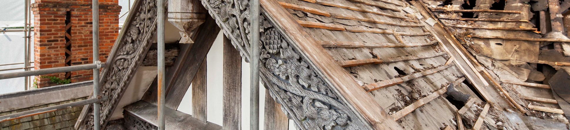 A view of decorated roof timbers at Grade II* listed Wythenshawe Hall, Manchester