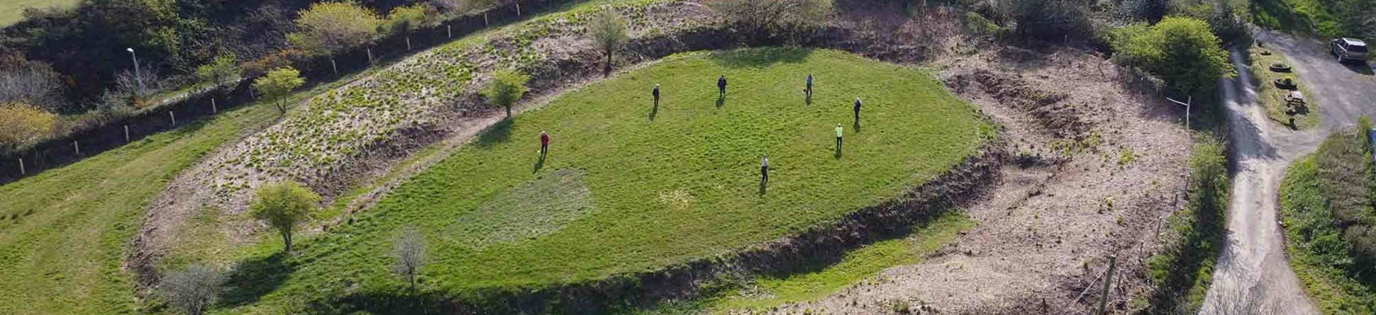 Aerial view of Castilly Henge with volunteers marking out the position of the newly discovered stone circle