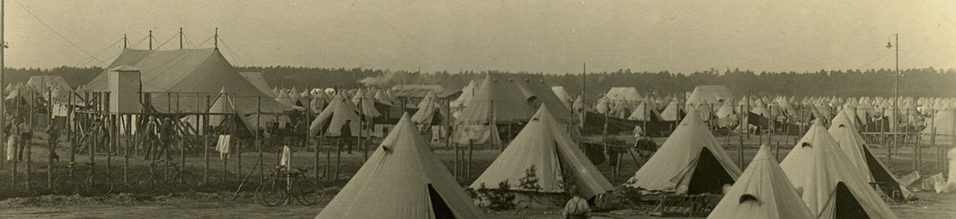 First World War Prisoner of War camp housed in canvas bell tents and large communal tents.