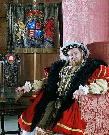 An actor playing Henry VIII at Eltham Palace