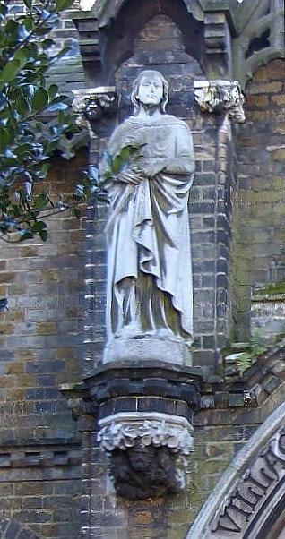 A romanticised statue of Baroness Burdett Coutts on the gateway to Holly Village, Highgate, London. © Jacqueline Banarjee at www.victorianweb.org/art/architecture/darbishire/8.html