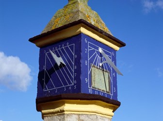 Detail of the Countess Pillar which has a blue sundial on it.