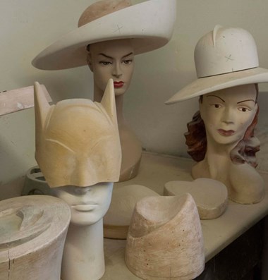 Boon & Lane carve plaster versions for the hat shapes they wish to create