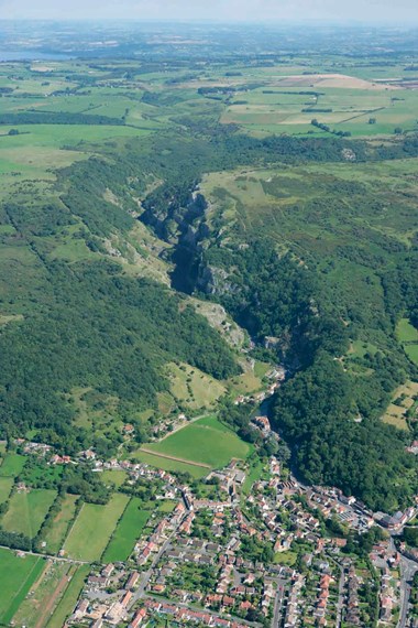 The spectacular chasm of Cheddar Gorge slices through the southern Mendip escarpment