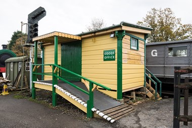 Isfield, one of the smallest types of goods shed, called a 'lock-up goods, built in 1898. The ramp and canopy were added after the site became a heritage railway.