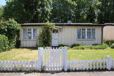 Phoenix prefabs with white picket fence