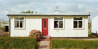 Archive colour photograph of a prefabricated house