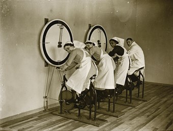 Nurses on stationary cycles in the gym