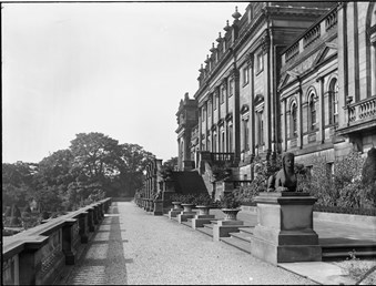 archive black and white photograph of the terrace and garden front of a large country house