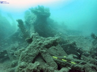 IonaII paddle wheel debris with paddle shaft above. Credit Wessex Archaeology