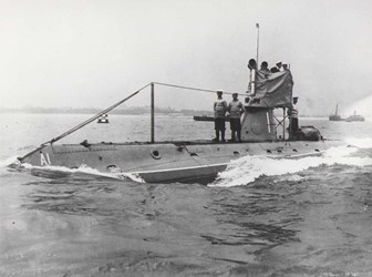 Sailors standing on a submarine