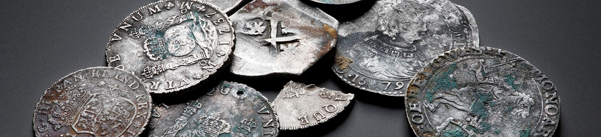 Collection of the different coins that were found in the wreck of the Rooswijk.