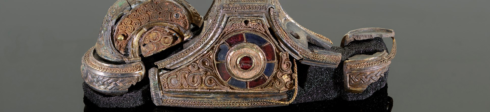 Image of reconstructed sword pommel, made up from fragments which are part of the Staffordshire Hoard