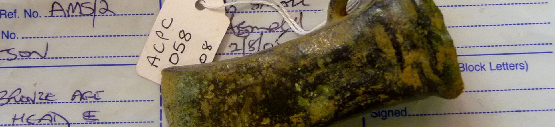 Bronze age axe head in police evidence bag