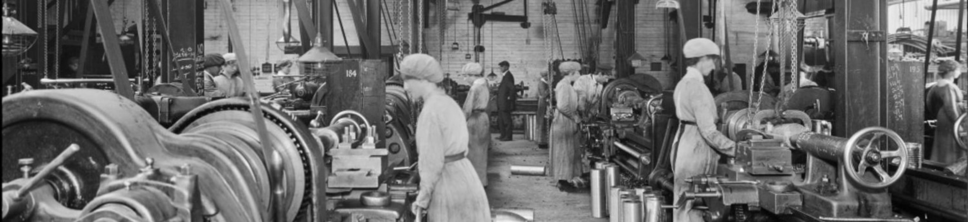 Cunards Shellworks, Liverpool, women workers operate large lathes to carefully finish steel artillery shells