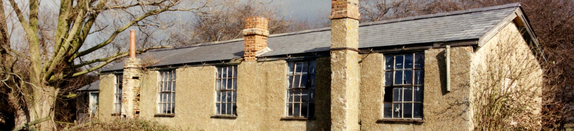 Stow Maries airfield, Essex, the single storey non-commissioned officers’ quarters, with its cast iron windows, projecting chimney stacks and slate roof remains virtually unaltered from a century ago